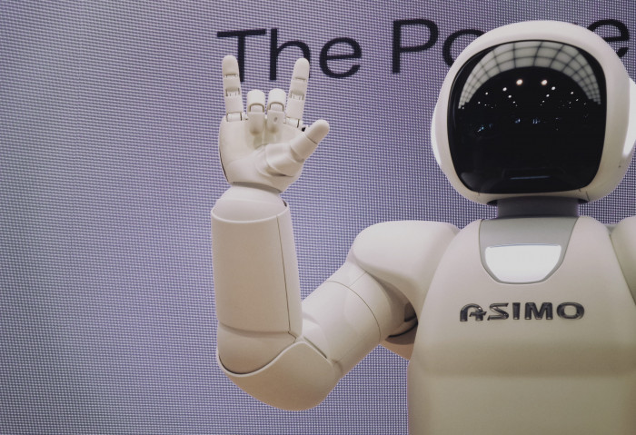 Asimo robot doing handsign technology metal humanoid artificial 2k 4k 5k