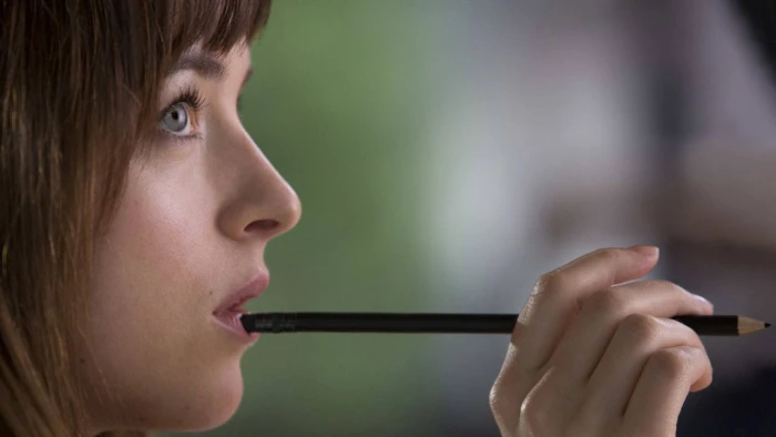 dakota johnson holding a pencil actress hollywood