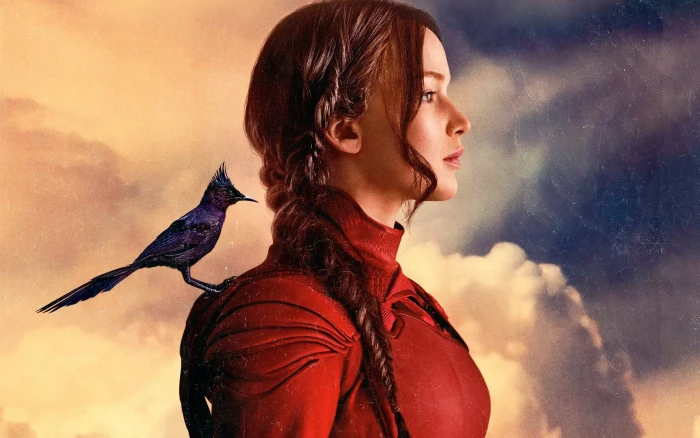 jennifer lawrence with black mockingjay bird actress hollywood 2k