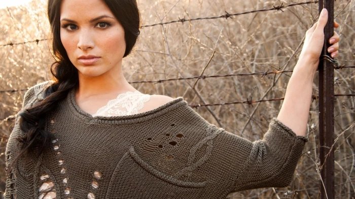 women's gray knit sweatshirt model brunette long hair face