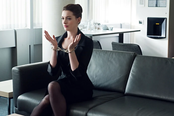 anne hathaway handcuffs the dark knight rises women actress