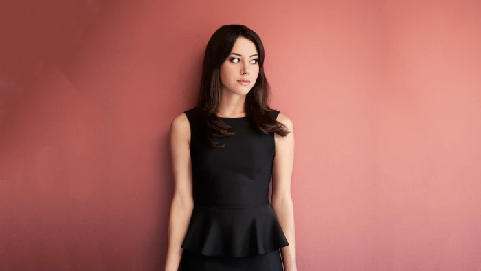 celebrity women Aubrey Plaza dress brunette looking into the distance