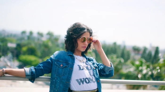 Naomi Scott women actress brunette with shades looking into the distance