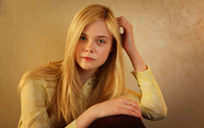 women actress blonde face blue eyes long hair shirt Elle Fanning