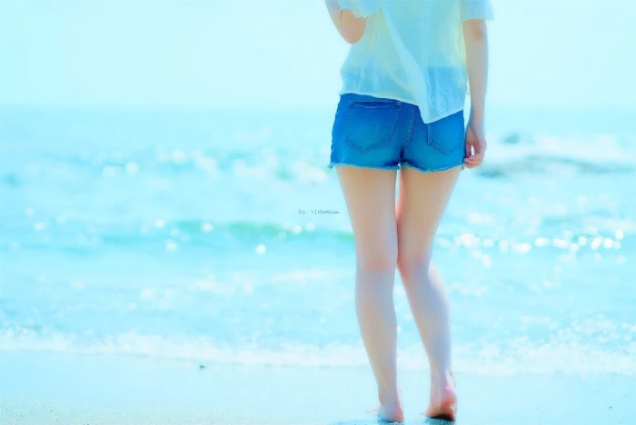 women's white top and blue denim shorts beach Japanese women
