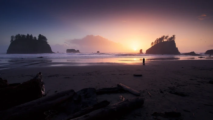 brown sand beach sunset island water sea sky rock object 2k