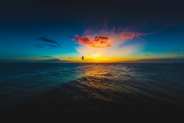 silhouette of kite surfing sea sky kitesurfing water scenics nature
