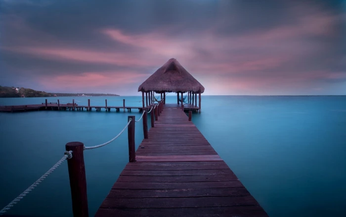 brown wooden dock on body of water during daytime nature landscape 2k