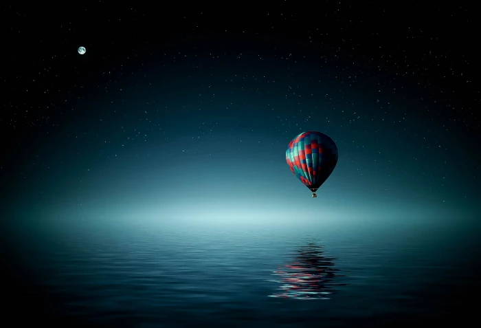 hot air balloon above the ocean during nighttime Lightroom Preset 2k