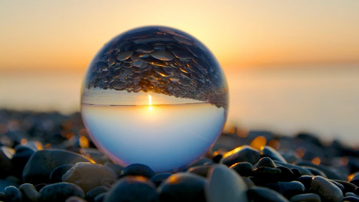 beach reflection marble pebbles sphere sunset sky nature 2k