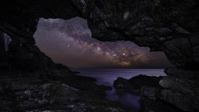 cave beside water wallpaper nature night stars Milky Way 2k