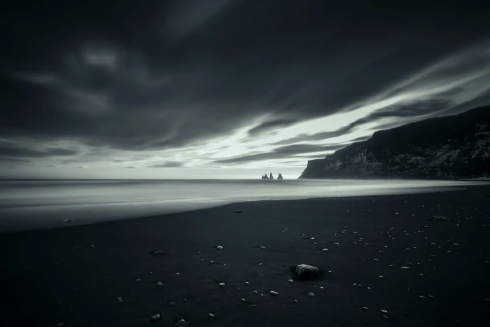 seashore dark nature sky beach sand stones cloud 2k