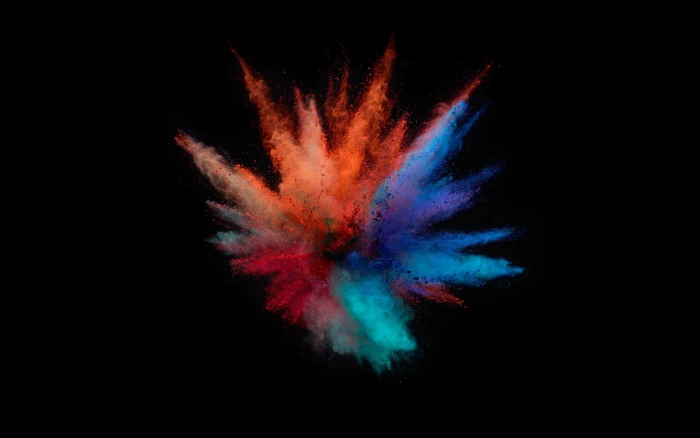 photo of colored powder blast MacBook colorful minimalism 2k