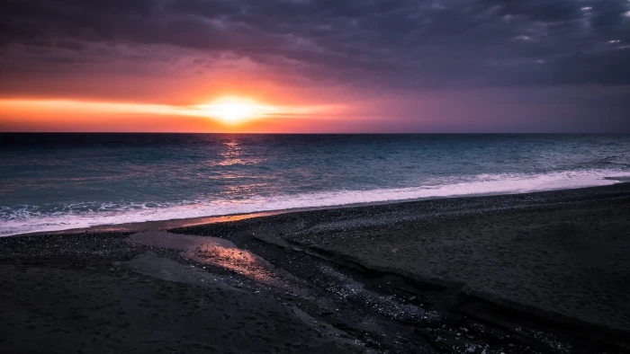 sea shore during sunset paola italy stormy Seascape 2k