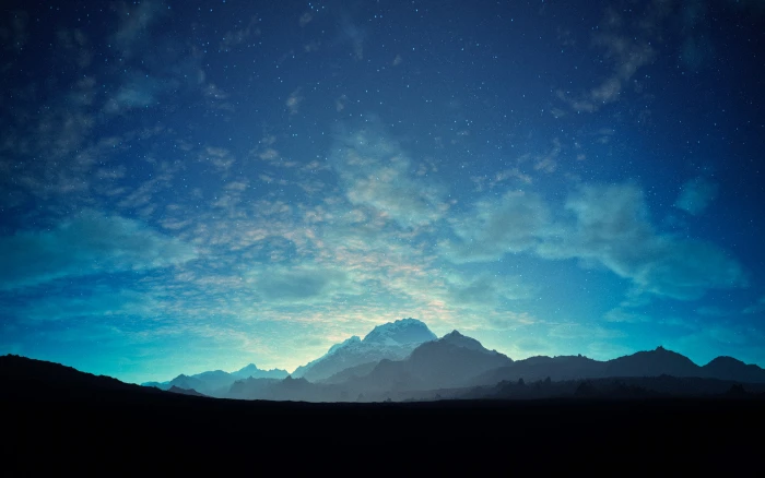 silhouette of mountain under cloudy blue sky photo mountains and white clouds 98 2k