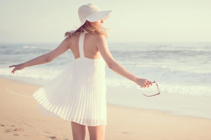 Woman wearing hat and summer dress people beach fashion girl 2k 4k
