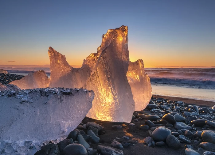 ice formation during sunset in beach Icy Sunrise J kuls rl n Iceland