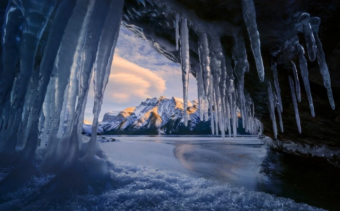ice shards cave mountains winter snowy peak lake Banff National Park