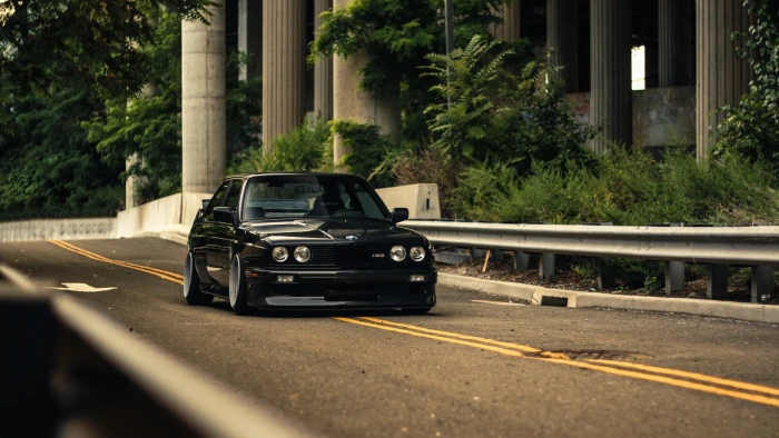 black BMW sedan car transportation mode of 2k