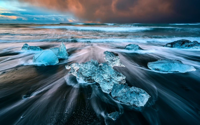 blue stones nature ice water sea waves long exposure Iceland 2k