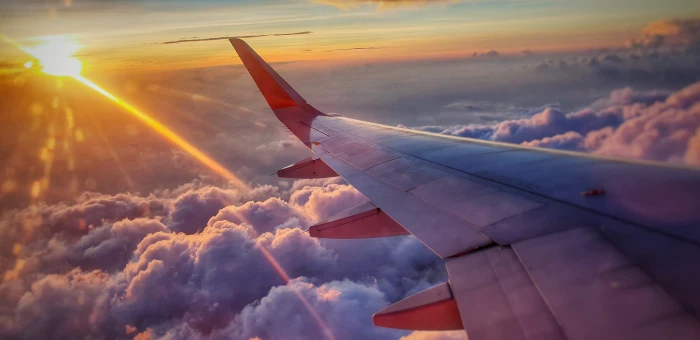 aerial photography of airplane flying over sea clouds vehicle 2k 4k