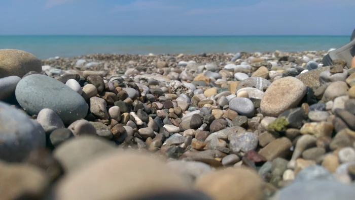 beach stones sea horizon land solid rock water stone object 2k