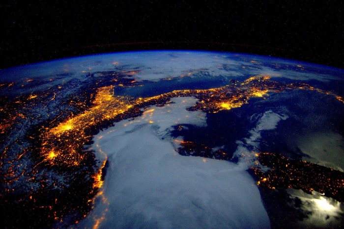 earth during nighttime photo taken from ISS space view italy 2k