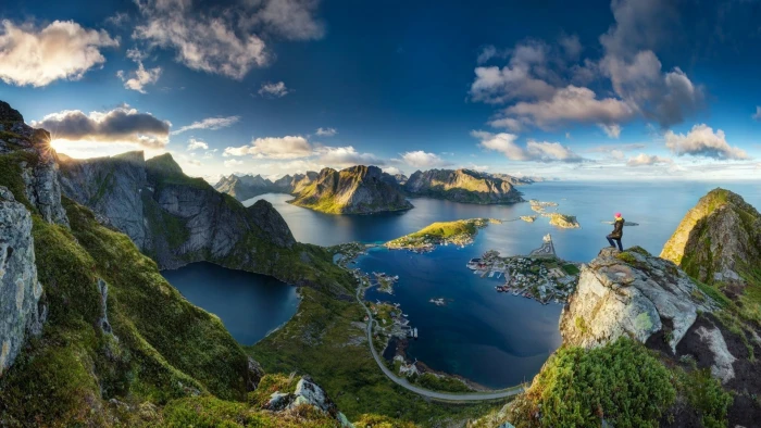 scenery of landscape person standing on cliff Lofoten Norway 2k