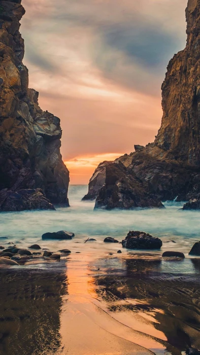 vertical portrait display water sea land rock object