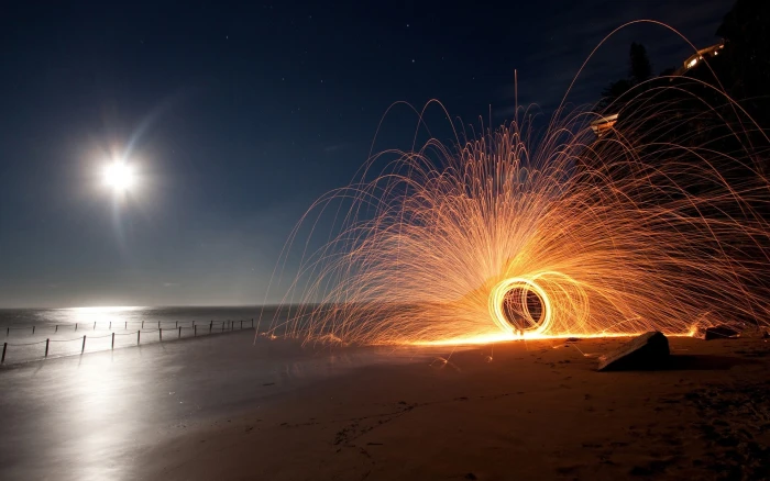 long exposure beach night motion illuminated land wire wool 2k