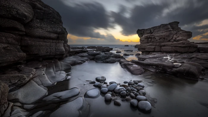 black stone and cliff beside body of water liscannor clare ireland 2k