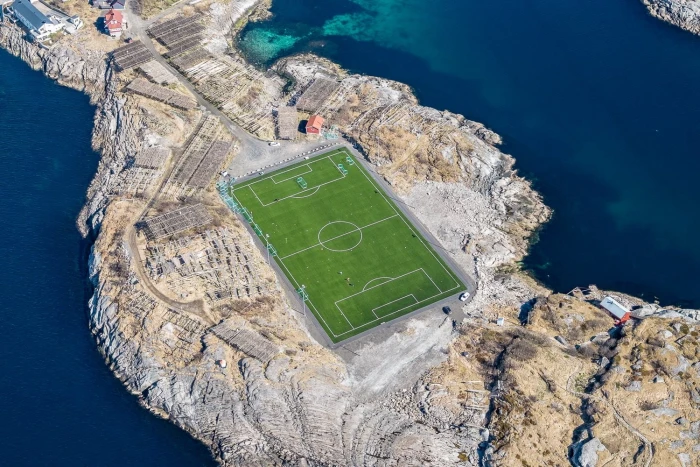 green soccer field landscape pitches sea Lofoten Islands 2k