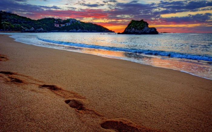 brown seashore beach coast island sunset water sky beauty in nature 2k