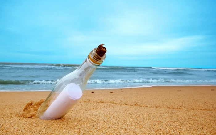 clear glass bottle sand sea beach letter water river background 2k