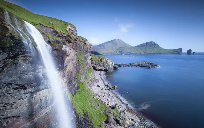 waterfall beach mountains Faroe Islands coast nature scenics 2k