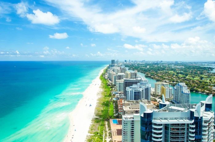 gray high rise building lot beach summer the ocean Miami 2k