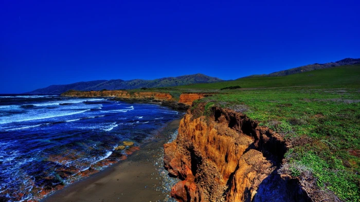 beach cliff coast nature landscape clear sky waves sea 2k