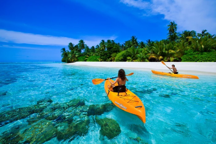 Canoe On Blue Lagoon In Maldives two orange kayak island exotic 2k