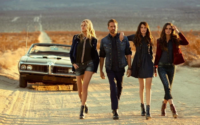 men s blue denim button up jacket Paul Walker in between three women 2k