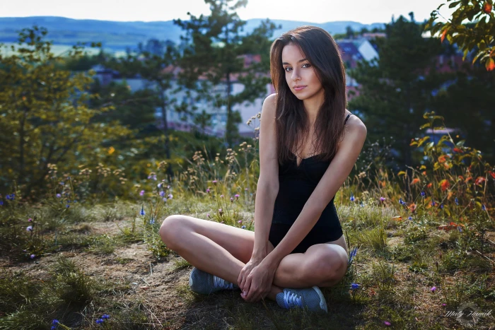 women s black camisole nature legs crossed outdoors 2k