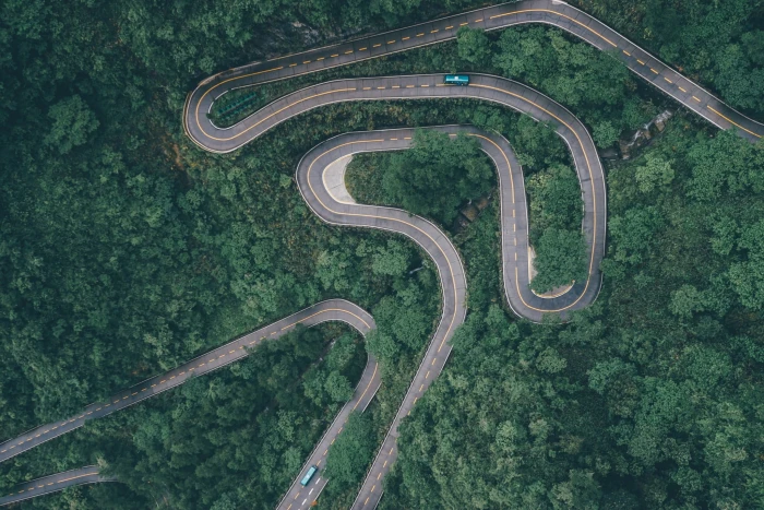 gray concrete road nature forest car buses river green 2k