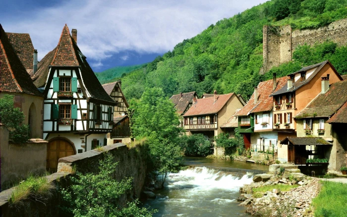 brown wooden house lot near body of water france buildings 2k