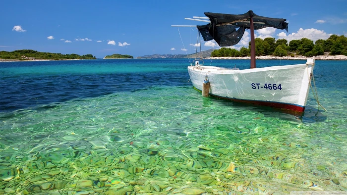 Small boat fishermen white st sea water beach 2k