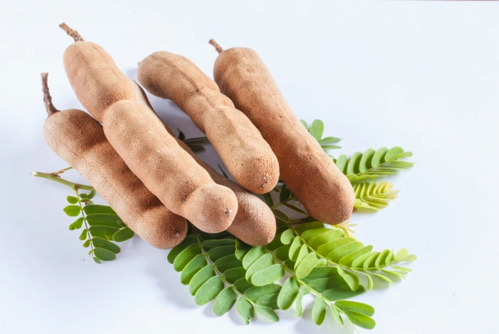 five brown tamarinds fruits food fresh natural tropical 2k 4k