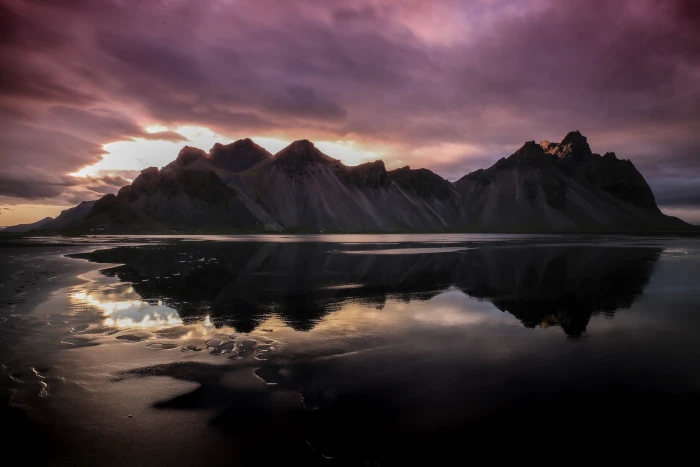 mountains reflecting on body of water Black Sand Beach Summer Solstice Sunset Iceland 2k 4k 5k