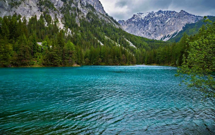 mountains surrounded by body of water nature landscape summer 2k
