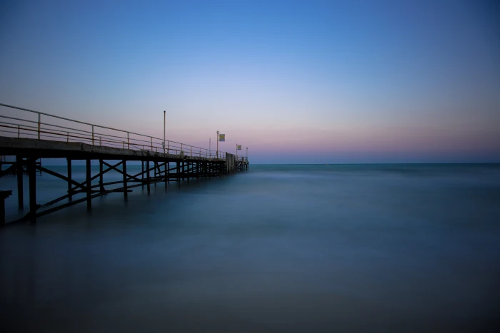bridge surrounded by body of water under blue sky bulgaria 2k 4k 5k