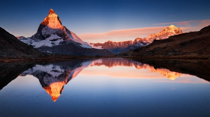 Apple Mountain body of water and snow covered mountains Computers 2k 4k