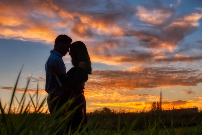Photo of Couple Hugging During Dawn clouds field girl golden hour 2k 4k 5k