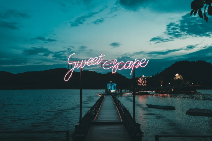 brown wooden harbor dock Sweet Escape signage neon light sky 2k 4k 5k